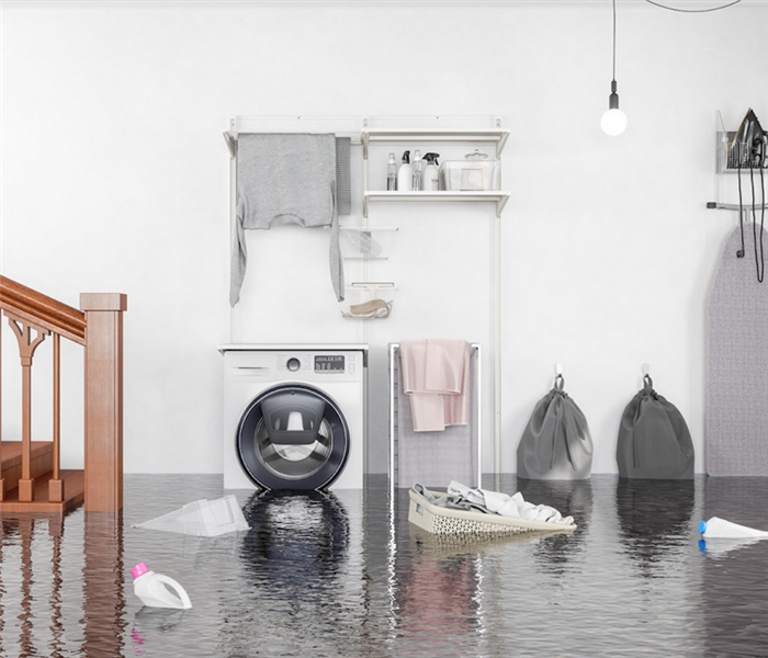 a flooded laundry room with furniture floating everywhere